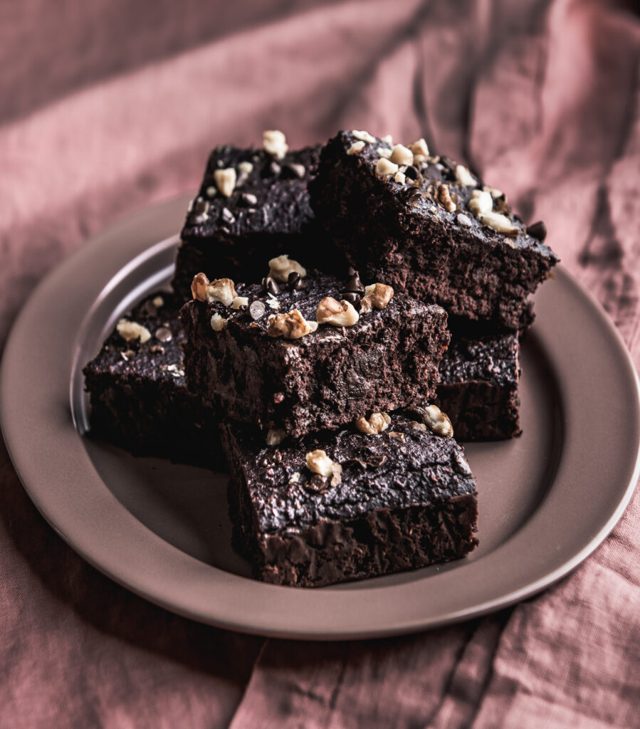 beet brownies on a pink plate